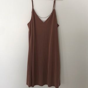 Beige dress with chained back